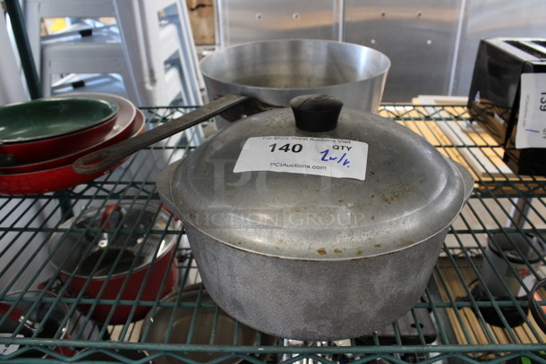 2 Metal Items; Sauce Pot and Stock Pot w/ Lid. 21x11x5.5, 12x10x7. 2 Times Your Bid!