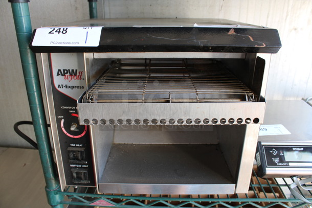 APW Wyott Stainless Steel Commercial Countertop Conveyor Toaster Oven. 120 Volts, 1 Phase. 15x16x13. Tested and Working!