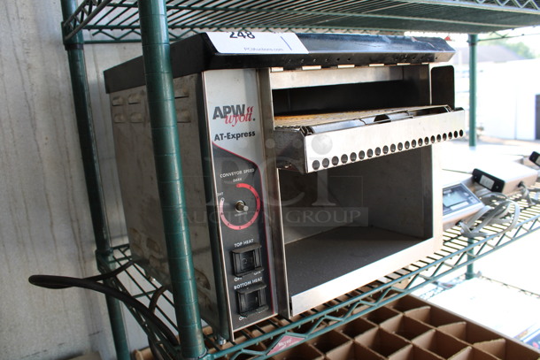 APW Wyott Stainless Steel Commercial Countertop Conveyor Toaster Oven. 120 Volts, 1 Phase. 15x16x13. Tested and Working! - Image 4 of 5