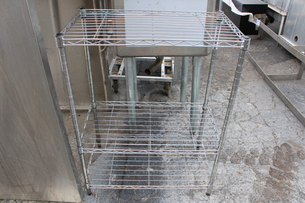 Chrome Finish 3 Tier Shelving Unit. BUYER MUST DISMANTLE. PCI CANNOT DISMANTLE FOR SHIPPING. PLEASE CONSIDER FREIGHT CHARGES. 23x13x30 - Image 1 of 3