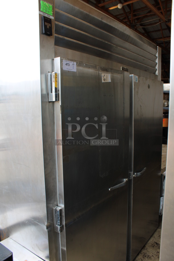 Traulsen Model AIF232LUT-FHS Stainless Steel Commercial 2 Door Roll In Rack Freezer. 115 Volts, 1 Phase. 68x35x84. Tested and Powers On But Does Not Get Cold