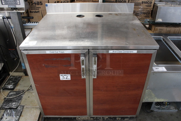 Duke Stainless Steel Counter w/ 2 Wood Pattern Doors. 36x30x40