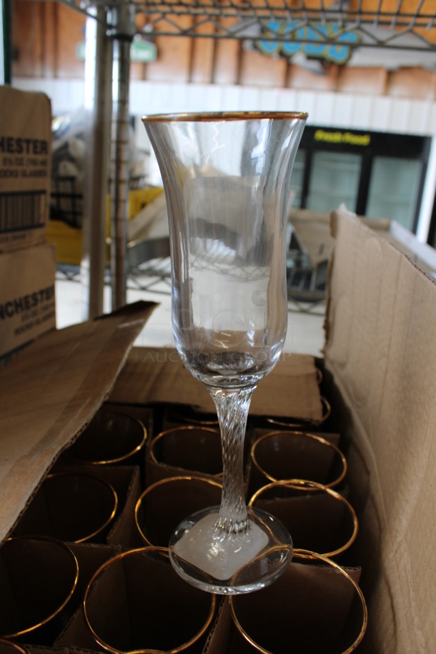 24 BRAND NEW IN BOX! Champagne Glasses. 2.5x2.5x8. 24 Times Your Bid!