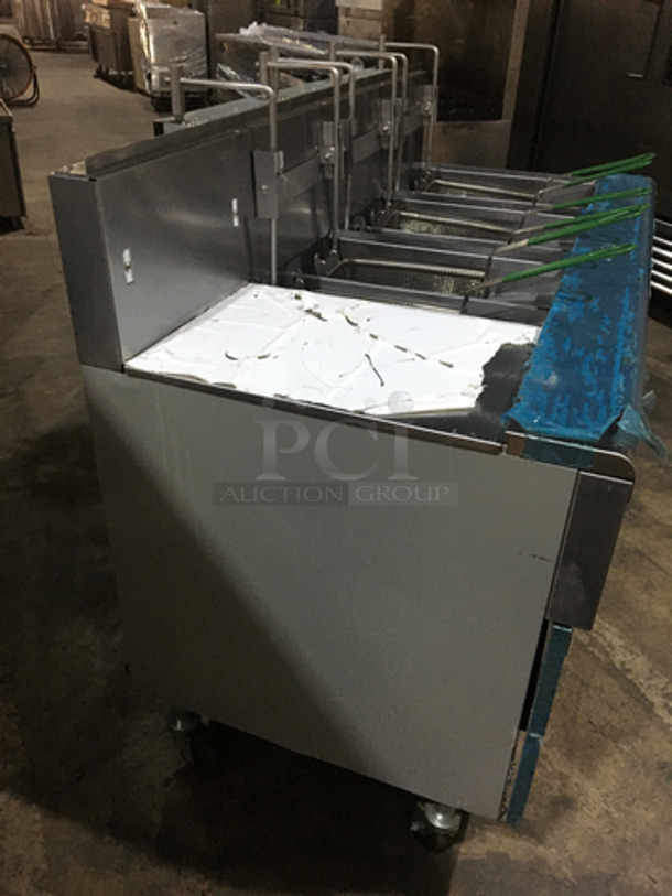 AMAZING! NEVER USED! Frymaster Commercial High Efficiency Natural Gas Powered 3 Bay Deep Fat Fryer! UNIQUE SPLIT BAY! With Dump Station! With Digital Control System! With Filter System! With Backsplash! With 6 Metal Frying Baskets! Model FMPH3556BLSD Serial 1206IJ0003! On Commercial Casters! - Image 4 of 12