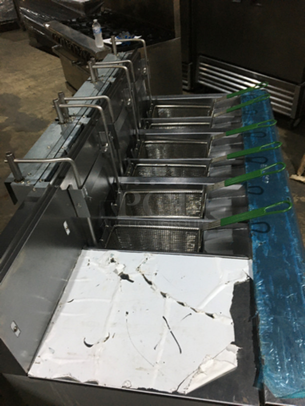 AMAZING! NEVER USED! Frymaster Commercial High Efficiency Natural Gas Powered 3 Bay Deep Fat Fryer! UNIQUE SPLIT BAY! With Dump Station! With Digital Control System! With Filter System! With Backsplash! With 6 Metal Frying Baskets! Model FMPH3556BLSD Serial 1206IJ0003! On Commercial Casters! - Image 5 of 12