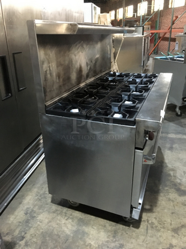 FABULOUS! American Range Commercial Natural Gas Powered 10 Burner Stove! With 2 Full Size Ovens Underneath! With Backsplash & Overhead Salamander Shelf! All Stainless Steel! On Casters! Working When Removed!  - Image 2 of 10