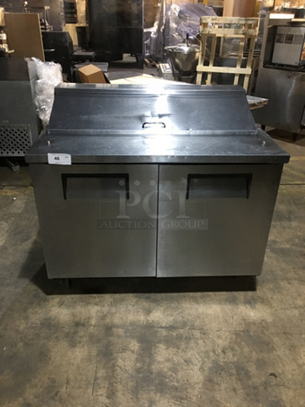 True Commercial Refrigerated Sandwich Prep Table! With 2 Door Underneath Storage Space Underneath! All Stainless Steel! Model TSSU4812 Serial 7765678! 115V 1Phase! On Commercial Casters!