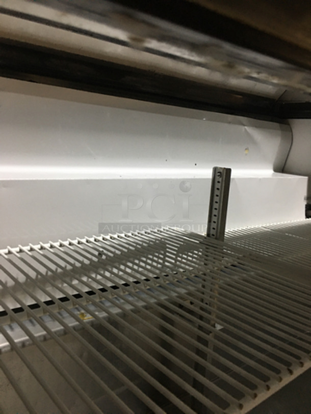 True Commercial Refrigerated Sandwich Prep Table! With 2 Door Underneath Storage Space Underneath! All Stainless Steel! Model TSSU4812 Serial 7765678! 115V 1Phase! On Commercial Casters! - Image 7 of 10