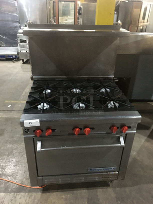 Montague Commercial Natural Gas Powered 6 Burner Stove! With Full Size Oven Underneath! With Backsplash & Overhead Salamander Shelf! All Stainless Steel! On Legs!