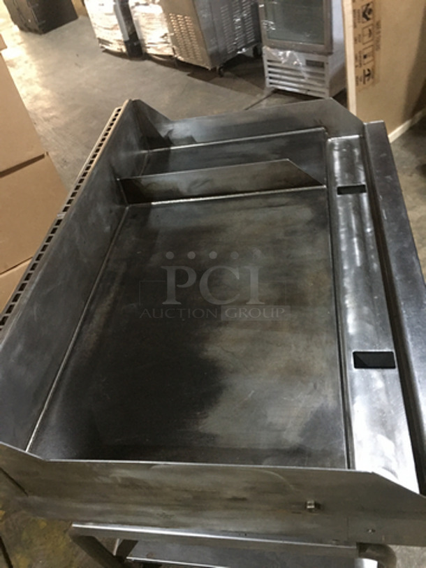 Woodstone Commercial Natural Gas Powered 48 Inch Flat Griddle! With Split Top! With Back & Side Splashes! With Underneath Storage Space! All Stainless Steel Equipment Stand! On Commercial Casters! - Image 5 of 10