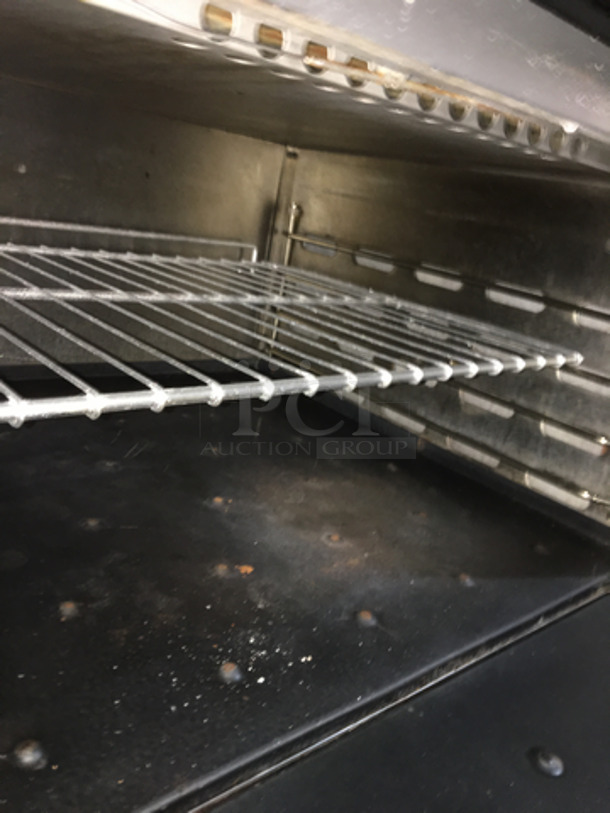 Montague Commercial Natural Gas Powered 6 Burner Stove! With Full Size Oven Underneath! With Backsplash & Overhead Salamander Shelf! All Stainless Steel! On Legs! - Image 8 of 10