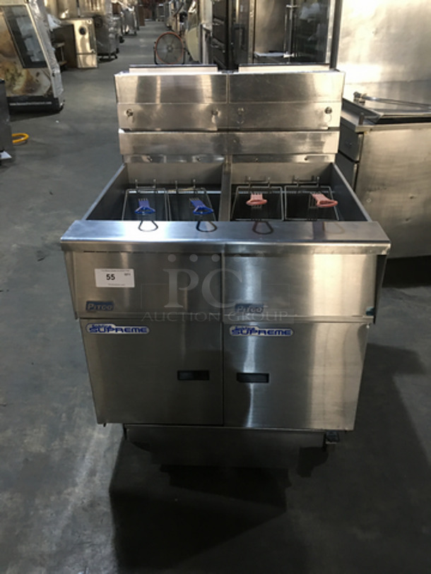 Pitco Frialator Commercial Natural Gas Powered Dual Bay Deep Fat Fryer! With Oil Filter System! With 4 Metal Frying Baskets! With Backsplash! All Stainless Steel! Model SSH55 Serial G10DD013458! On Commercial Casters!