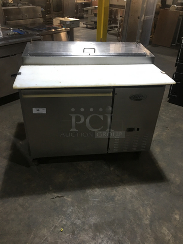 Nice! Entrée Commercial Refrigerated Pizza Prep Table! With Single Door Underneath Storage Space! With Commercial Cutting Board! All Stainless Steel! Model P47 Serial 1111CONH03010! 115V 1Phase! On Commercial Casters!