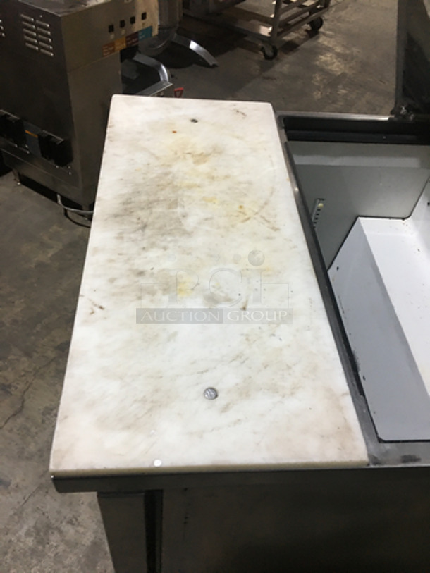 True Commercial Refrigerated Sandwich Prep Table! With Underneath Storage Space! All Stainless Steel! With Commercial Cutting Board! Model TSSU2708 Serial 6927796! 115V 1Phase! On Casters! - Image 9 of 10
