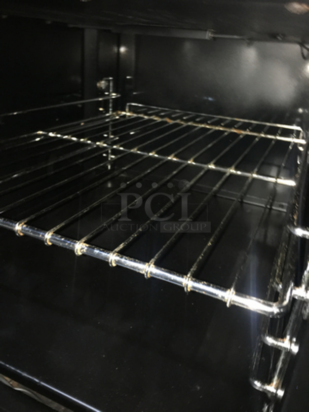 AMAZING! All Stainless Steel Natural Gas Powered 4 Burner Stove! With Oven Underneath! With Backsplash & Overhead Salamander Shelf! On Legs! - Image 8 of 10