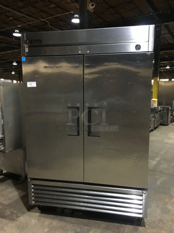Great! True 2 Door Heavy Duty Commercial Stainless Steel Reach In Freezer! With Poly Coated Racks! Model T49F Serial 7692658! 115V 1 Phase! On Commercial Casters! Working When Removed!