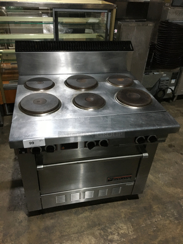Garland Commercial Electric Powered 6 Burner Stove! With Full Size Oven Underneath! With Backsplash! All Stainless Steel! On Casters!
 - Image 1 of 10