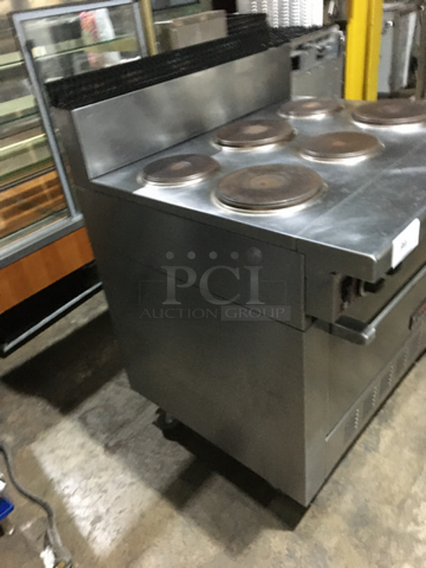 Garland Commercial Electric Powered 6 Burner Stove! With Full Size Oven Underneath! With Backsplash! All Stainless Steel! On Casters!
 - Image 2 of 10