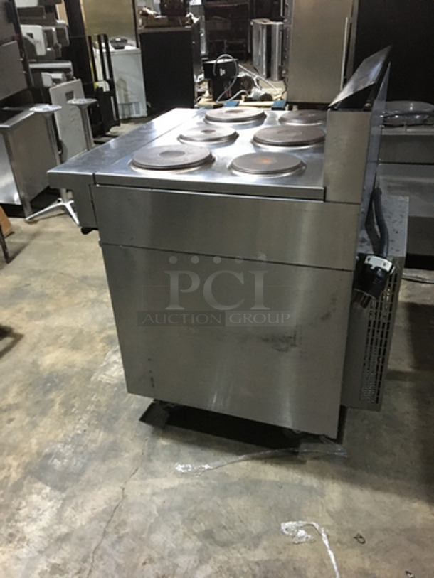 Garland Commercial Electric Powered 6 Burner Stove! With Full Size Oven Underneath! With Backsplash! All Stainless Steel! On Casters!
 - Image 3 of 10