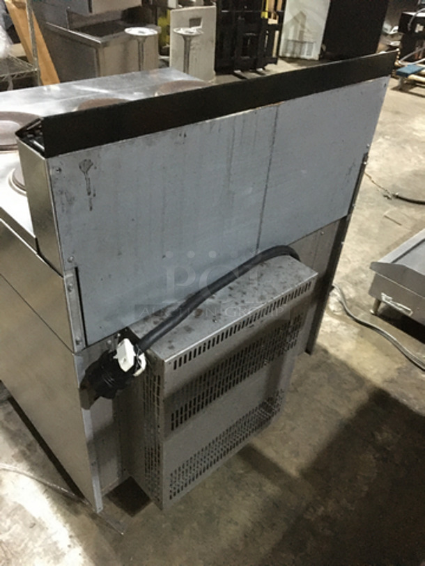 Garland Commercial Electric Powered 6 Burner Stove! With Full Size Oven Underneath! With Backsplash! All Stainless Steel! On Casters!
 - Image 4 of 10