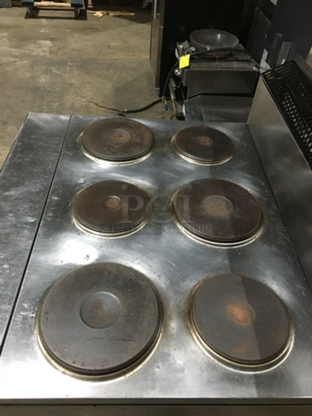 Garland Commercial Electric Powered 6 Burner Stove! With Full Size Oven Underneath! With Backsplash! All Stainless Steel! On Casters!
 - Image 5 of 10