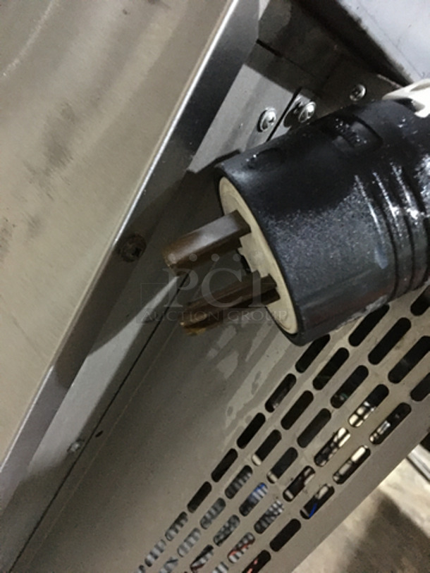 Garland Commercial Electric Powered 6 Burner Stove! With Full Size Oven Underneath! With Backsplash! All Stainless Steel! On Casters!
 - Image 10 of 10