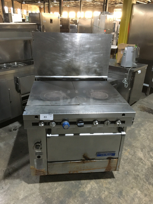 US Range Commercial Natural Gas Powered French Top/Hot Plate Stove! With Full Size Oven Underneath! With Backsplash! All Stainless Steel! On Casters! - Image 1 of 10