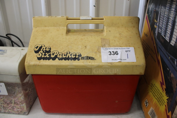 The Six Packer White and Red Poly Portable Cooler. 14x12x14