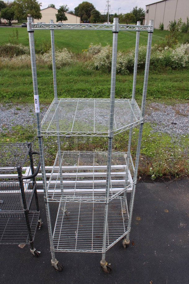 Chrome Finish 4 Tier Metro Style Shelving Unit on Commercial Casters. BUYER MUST DISMANTLE. PCI CANNOT DISMANTLE FOR SHIPPING. PLEASE CONSIDER FREIGHT CHARGES. 27x27x77 - Image 1 of 3