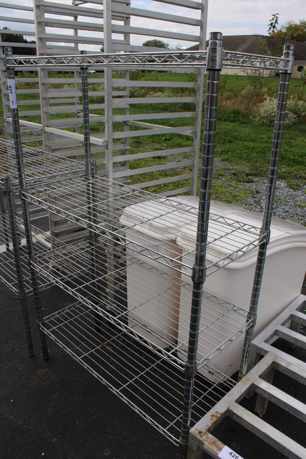 Chrome Finish 4 Tier Metro Style Shelving Unit. BUYER MUST DISMANTLE. PCI CANNOT DISMANTLE FOR SHIPPING. PLEASE CONSIDER FREIGHT CHARGES. 36x14x55 - Image 1 of 2