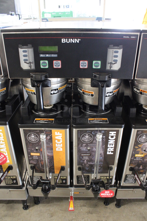 2012 Bunn Model DUAL SH DBC Stainless Steel Commercial Countertop Dual Coffee Machine w/ Hot Water Dispenser, 2 Stainless Steel Brew Baskets and 2 Bunn Model SH SERVER Satellite Servers. 120/208-240 Volts, 1 Phase. 18x24x36. Tested and Working!