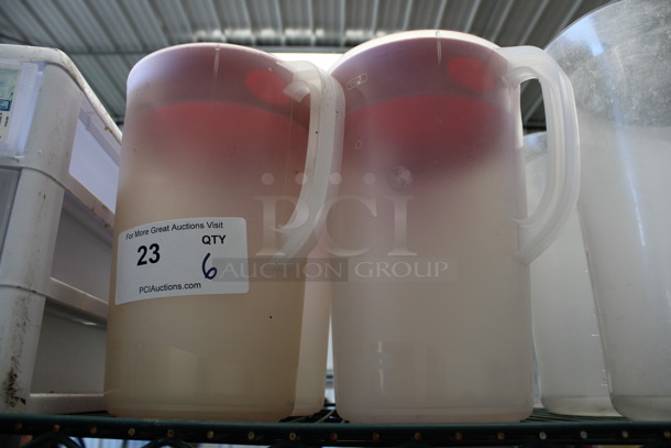 6 Clear Poly Pitchers w/ Red Lids. 8.5x6.5x10.5. 6 Times Your Bid! - Image 3 of 3