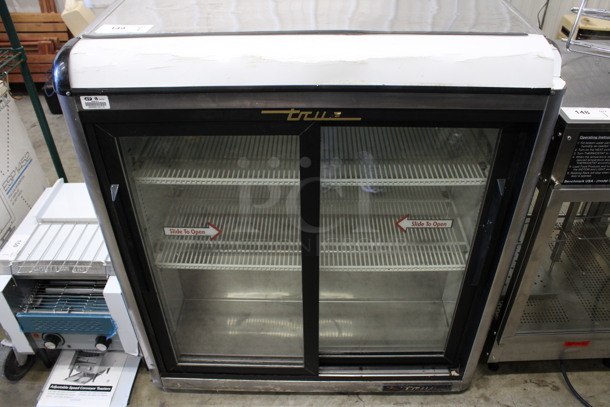 True Model GDM-09-S Stainless Steel Commercial 2 Door Cooler Merchandiser w/ Poly Coated Racks. 115 Volts, 1 Phase. 36x21x40. Tested and Working!