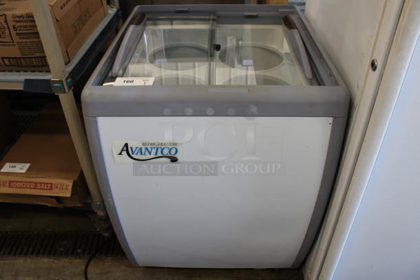 Avantco Model 360ADC4HC Metal Commercial Chest Display Freezer Merchandiser on Commercial Casters. 115 Volts, 1 Phase. 26x27x35. Tested and Working!