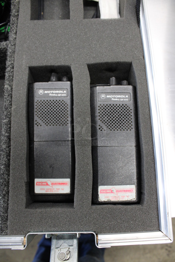 ALL ONE MONEY! Lot of 2 Motorola Radius GP300 Radios, 2 Chargers and 3 Red Headphones in Black Metal Box! 24x19x8 - Image 6 of 7