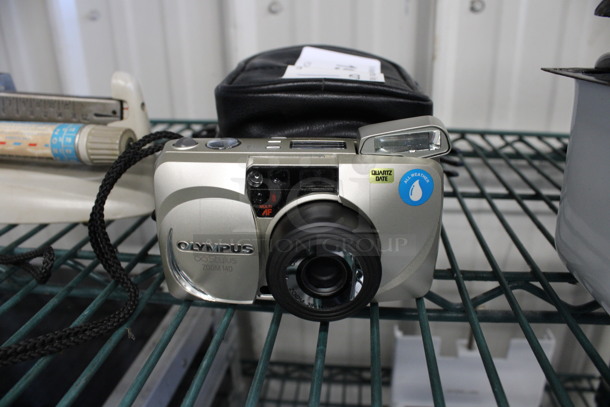 Olympus Stylus Zoom 140 Camera in Case. 5x2x2.5 - Image 1 of 3