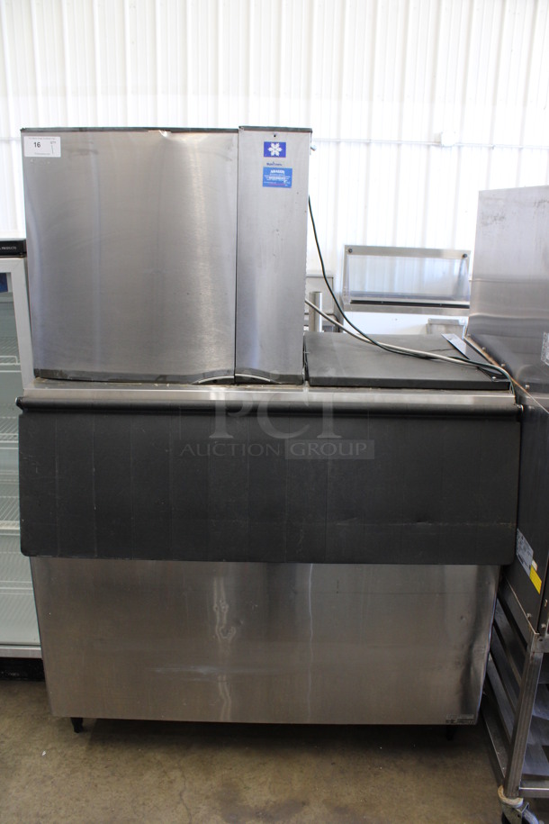 Manitowoc Model SY0854A Stainless Steel Commercial Air Cooled Ice Machine Head on Commercial Ice Bin. 208-230 Volts, 1 Phase. 53x35x73