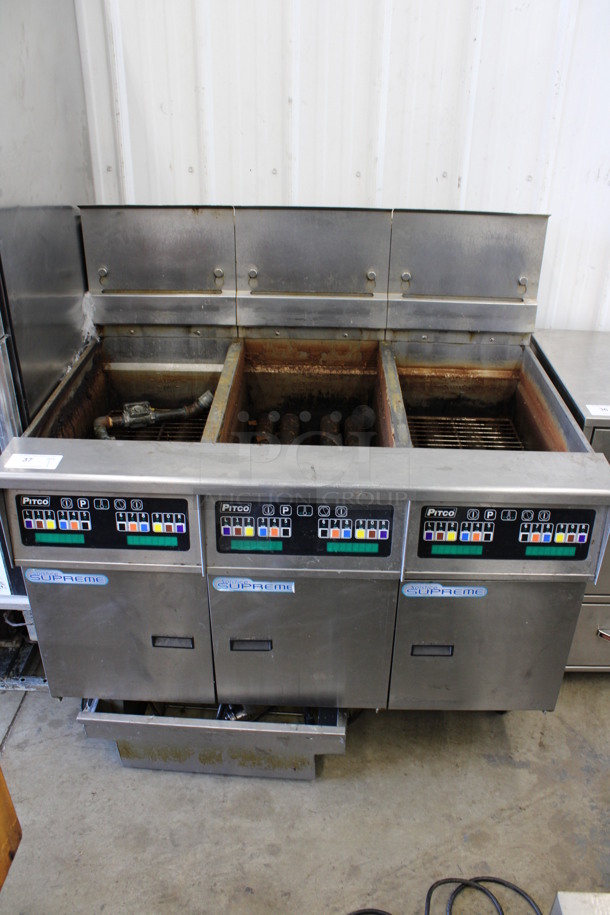 2015 Pitco Frialator Model SSH60 ENERGY STAR Stainless Steel Commercial Natural Gas Powered 3 Bay Deep Fat Fryer w/ Filtration System on Commercial Casters. 80,000 BTU. 47x35x48