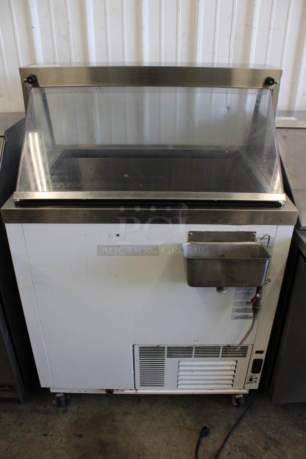 Stainless Steel Commercial Ice Cream Dipping Cabinet Merchandiser w/ Dipwell on Commercial Casters. 115 Volts, 1 Phase. 37x34x55. Tested and Working!