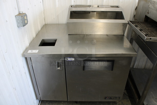 True Model TSSU-27-08 Stainless Steel Commercial Single Door Work Top Cooler w/ Bar Topping Rail and Left Side Trash Can Shell on Commercial Casters. 115 Volts, 1 Phase. 44x34x47.5. Tested and Working!