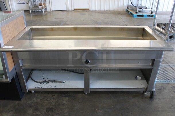 Stainless Steel Commercial Electric Powered Steam Table w/ Metal Under Shelf. 208-250 Volts, 1 Phase. 72x32x35