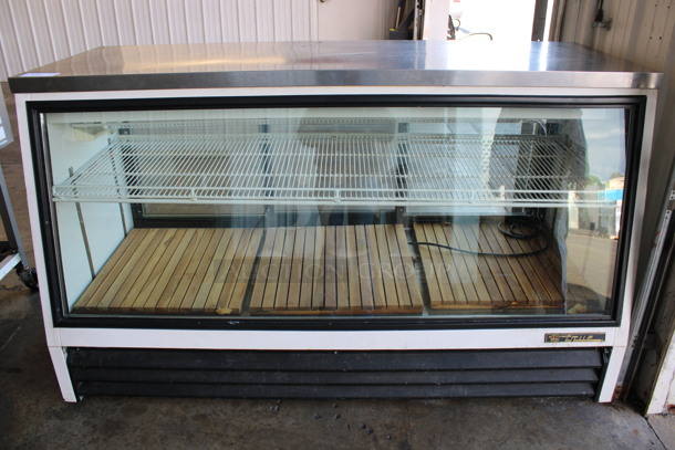 2014 True Model TSID-72-3L Metal Commercial Floor Style Deli Display Case Merchandiser w/ Poly Coated Racks. 115 Volts, 1 Phase. 72x32x42. Tested and Working!