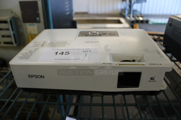 Epson Model EMP-1705 LCD Projector. 100-240 Volts, 1 Phase. 11x8x3