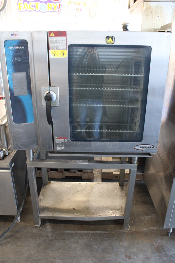 2014 Alto Shaam Model 10.10 ESI Stainless Steel Commercial Electric Powered Combitherm Convection Oven w/ View Through Door and Metal Oven Racks on Stainless Steel Equipment Stand. 208-240 Volts, 3 Phase. 45x32x68