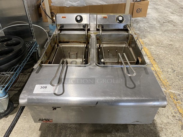 APW Wyott Model HEF-30Ti Stainless Steel Commercial Countertop Electric Powered 2 Well Fryer w/ 2 Metal Baskets. 208-240 Volts. 24x30x17