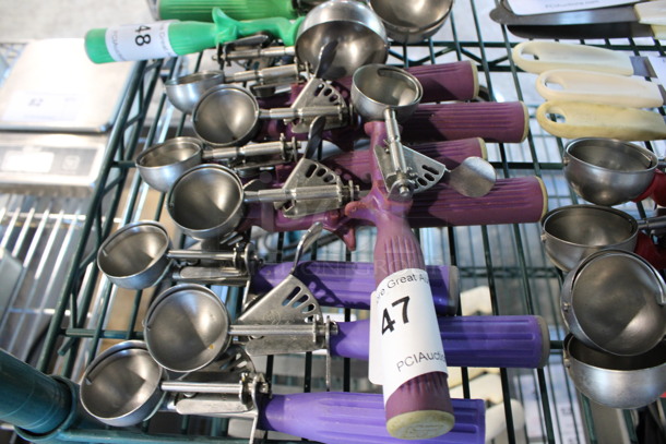 8 Stainless Steel Scoopers w/ Purple Handle. 8.5