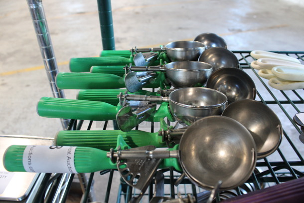 8 Stainless Steel Scoopers w/ Green Handle. 9