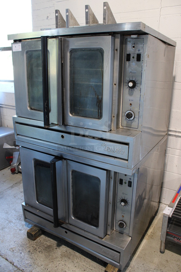 2 Garland SunFire Stainless Steel Commercial Natural Gas Powered Full Size Convection Ovens w/ View Through Doors, Metal Oven Racks and Thermostatic Controls. Comes w/ 4 11.5