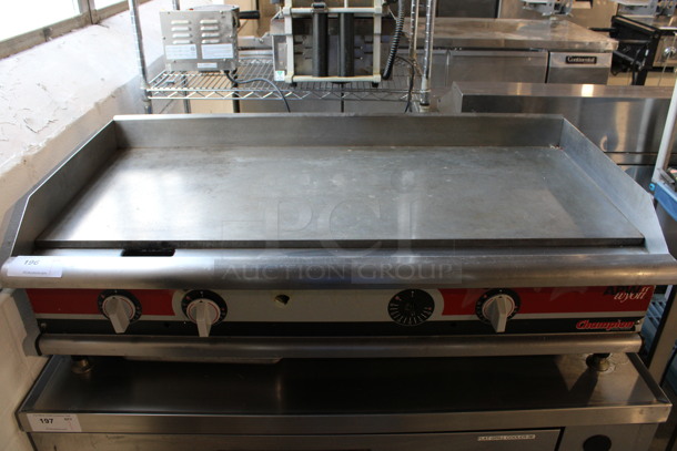 APW Wyott Champion Stainless Steel Commercial Natural Gas Powered Flat Top Griddle w/ Thermostatic Controls. 48x26x15.5