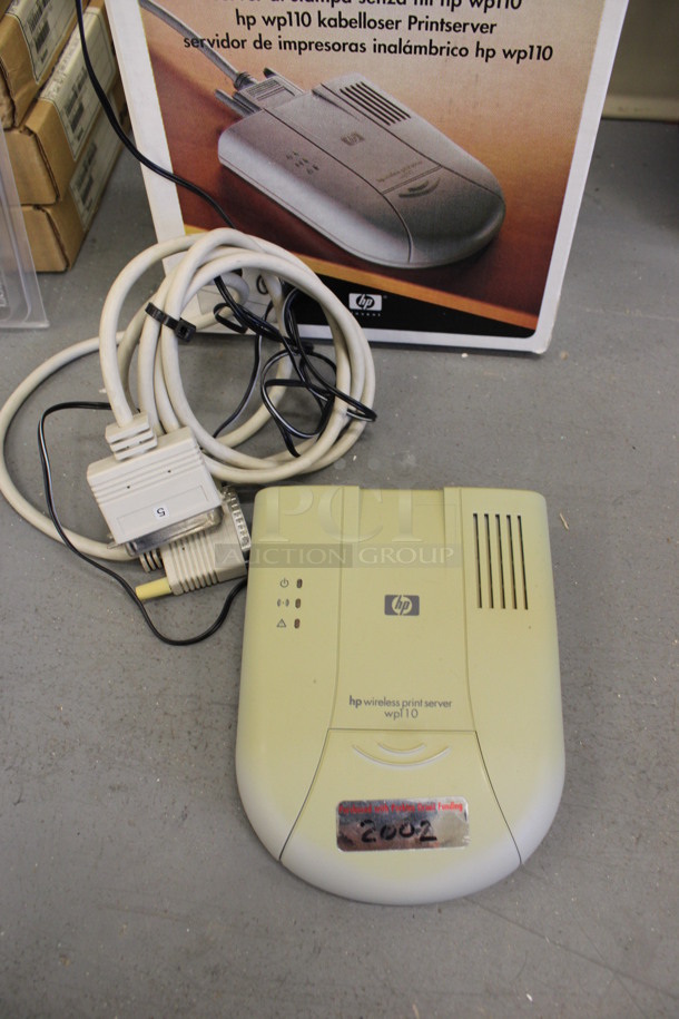 2 HP WPL 10 Wireless Print Servers. 5.5x7x1.5. 2 Times Your Bid! (Basement: Room 019)  - Image 1 of 4
